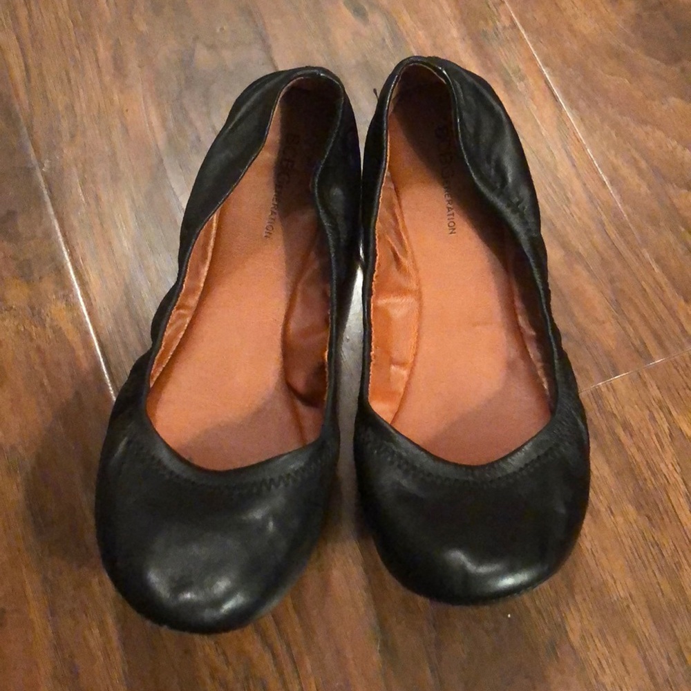Black leather flats